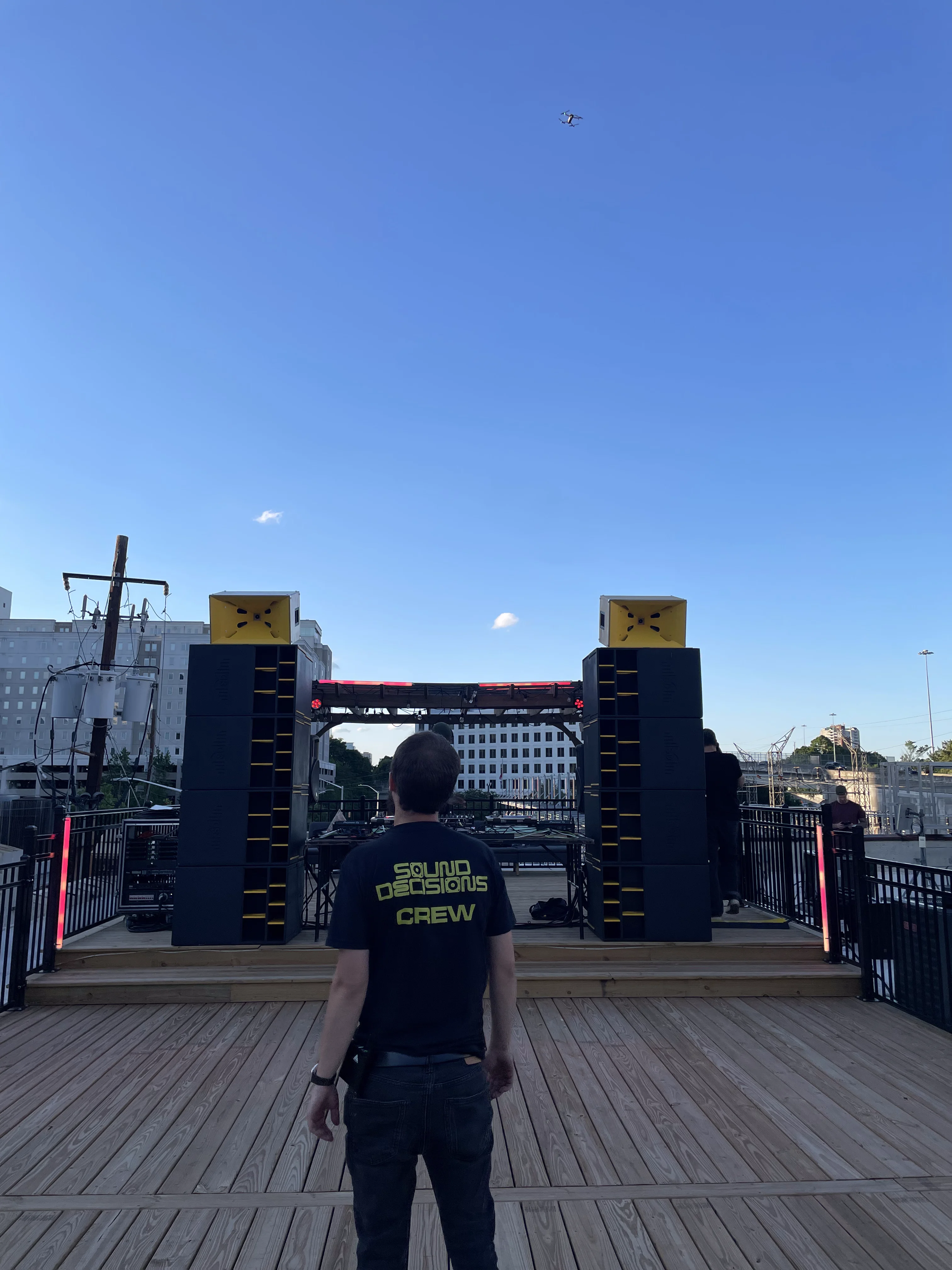 Sound Decisions crew surveying system on rooftop deck