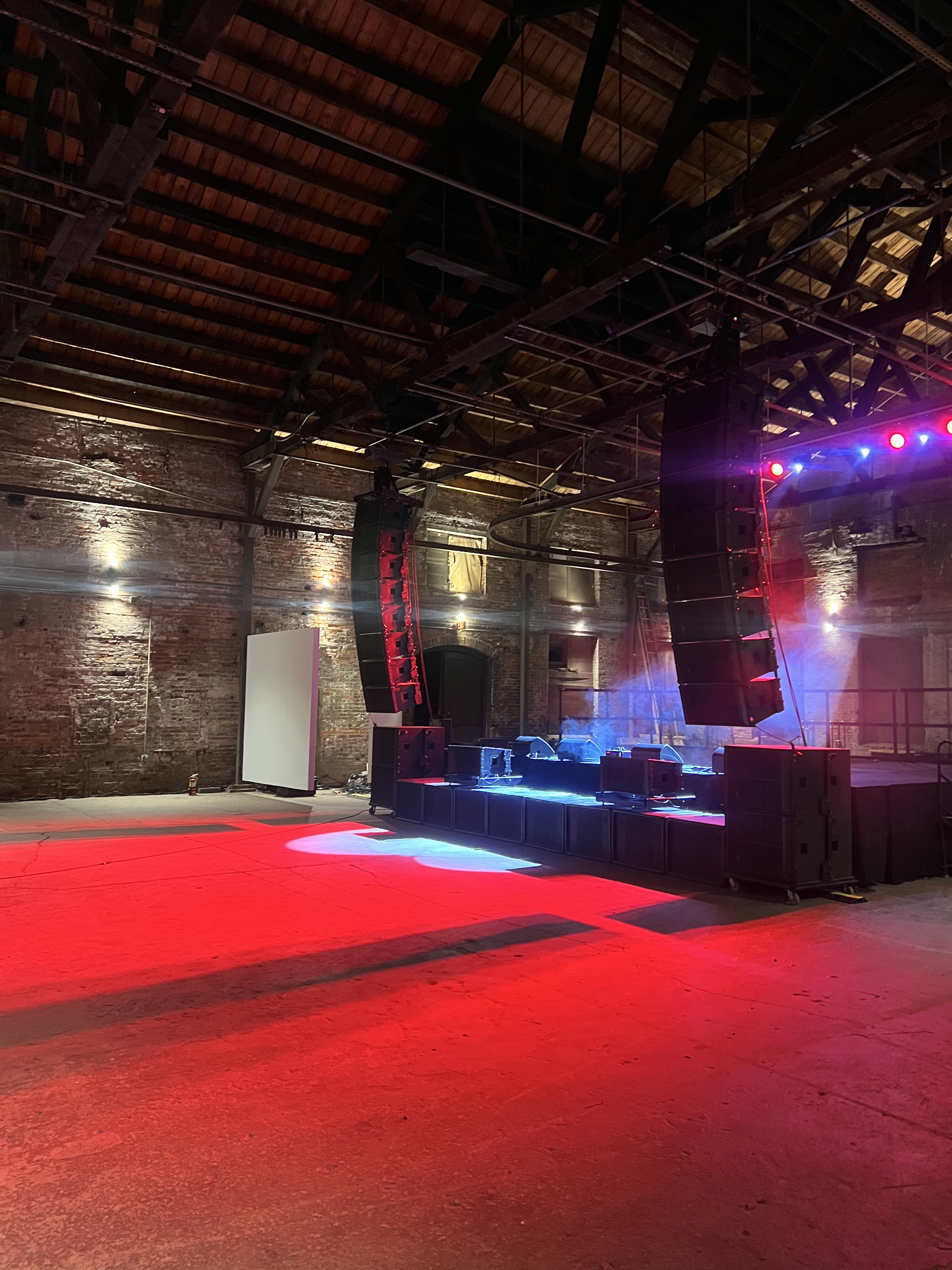 Flown line array and full lighting rig on main stage