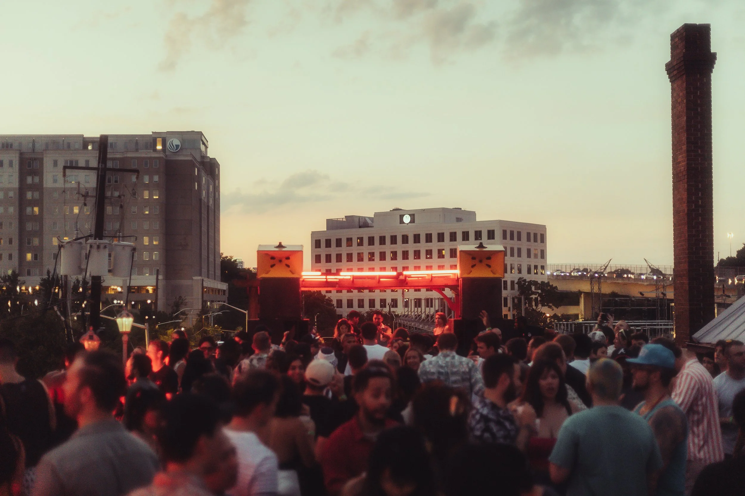 Rooftop event at sunset with Sound Decisions system